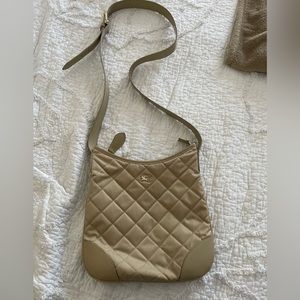 Burberry quilted cross body bag in nude.